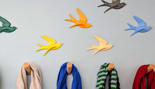 Recycled marine plastic swallow wall art by Lucky Swallows displayed at Ooshke gift shop Kyle of Lochalsh